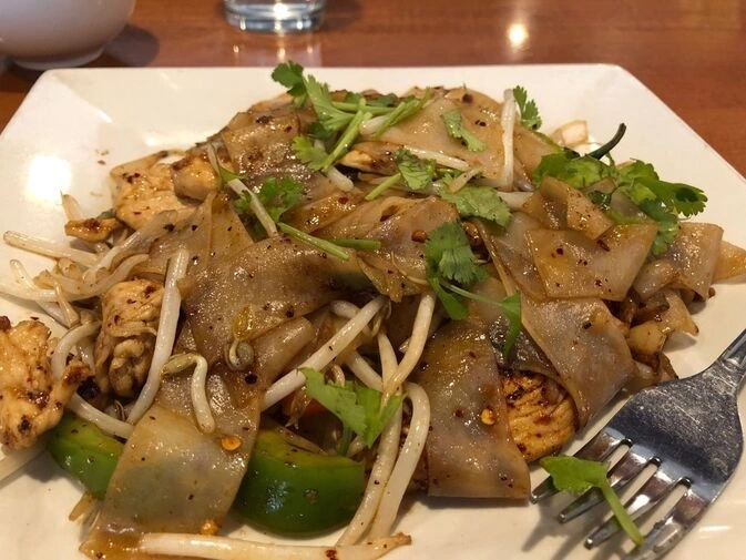 Drunken noodles with garlic, Thai chilies, bell peppers and hot basil at Takhrai Thai Poway